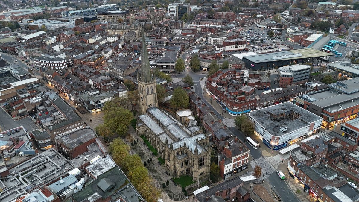 Aerial view of Wakefield Cathedral and the city rooftops